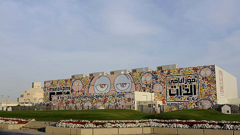 Exterior of Al Riwaq Exhibition Hall, Doha, Qatar © Artwork ©Takashi Murakami/Kaikai Kiki Co., Ltd. All Rights Reserved. Photo by GION