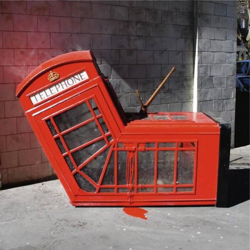 Banksy - Vandalised Phone Box, 2005 © Banksy
